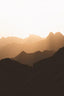 Silhouette Of Mountain Range At Sunrise